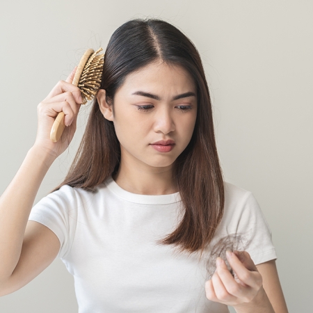 Nguyên nhân rụng tóc nhiều ở nữ